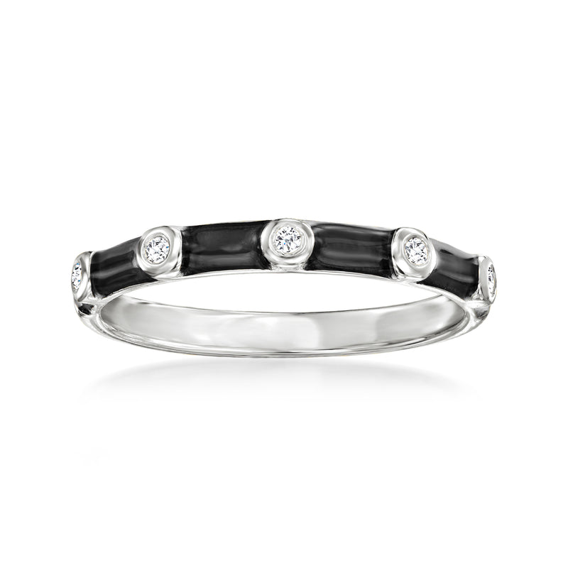 Sterling silver ring with black enamel band and four round bezel-set clear stones