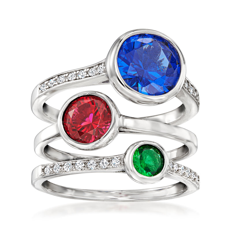 Sterling silver three-ring set with blue, red, and green simulated gemstone centers and CZ accents
