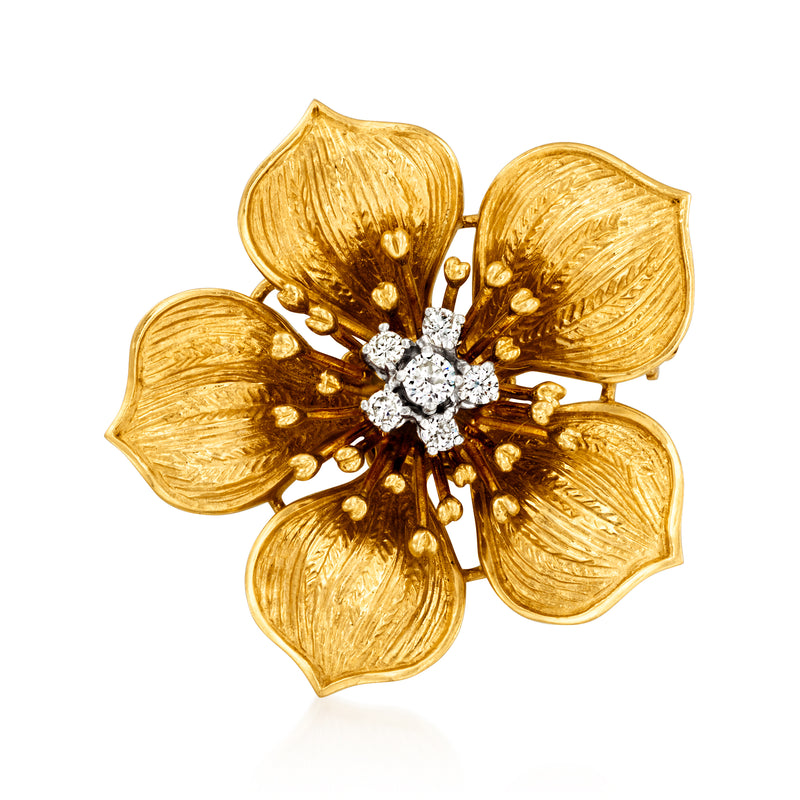 Vintage diamond flower pin in 18kt yellow gold with five petal-like leaves and round center