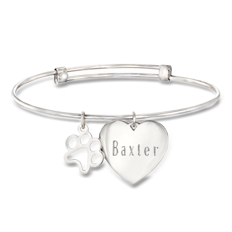 Sterling silver bangle bracelet with paw print charm and heart tag engraved 'Baxter'