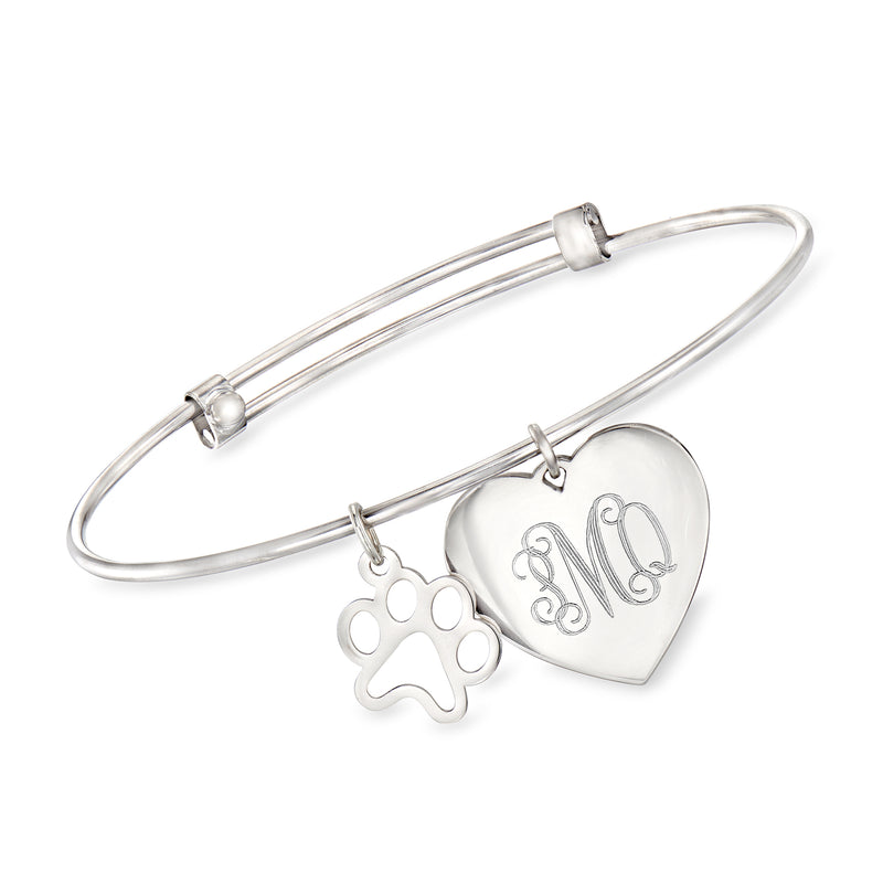 Sterling silver bangle bracelet with paw print charm and heart charm with cursive engraving
