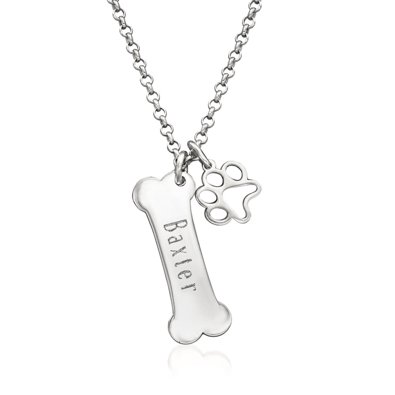 Sterling silver bone necklace with paw print charm and engraved “Betty” tag