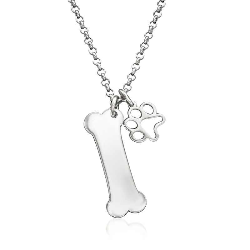 Sterling silver bone pendant with paw print charm on a chain