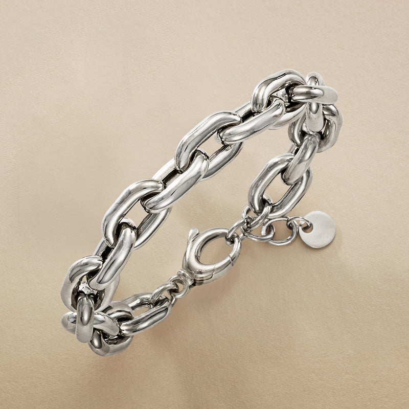 Italian sterling silver chunky cable-link bracelet close-up with lobster clasp and links.