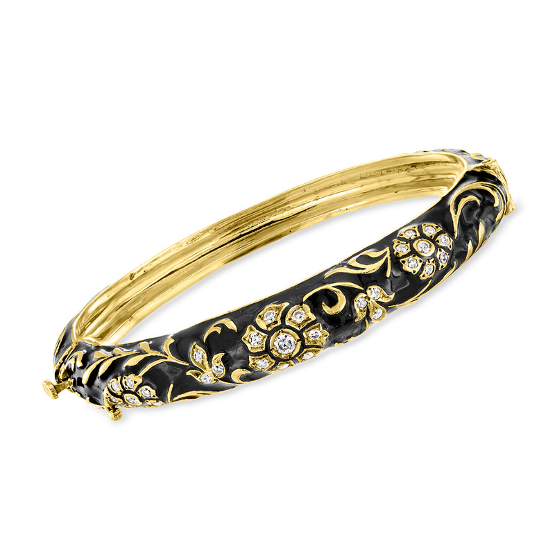 14k yellow gold bangle with black enamel floral pattern and sparkling diamond accents