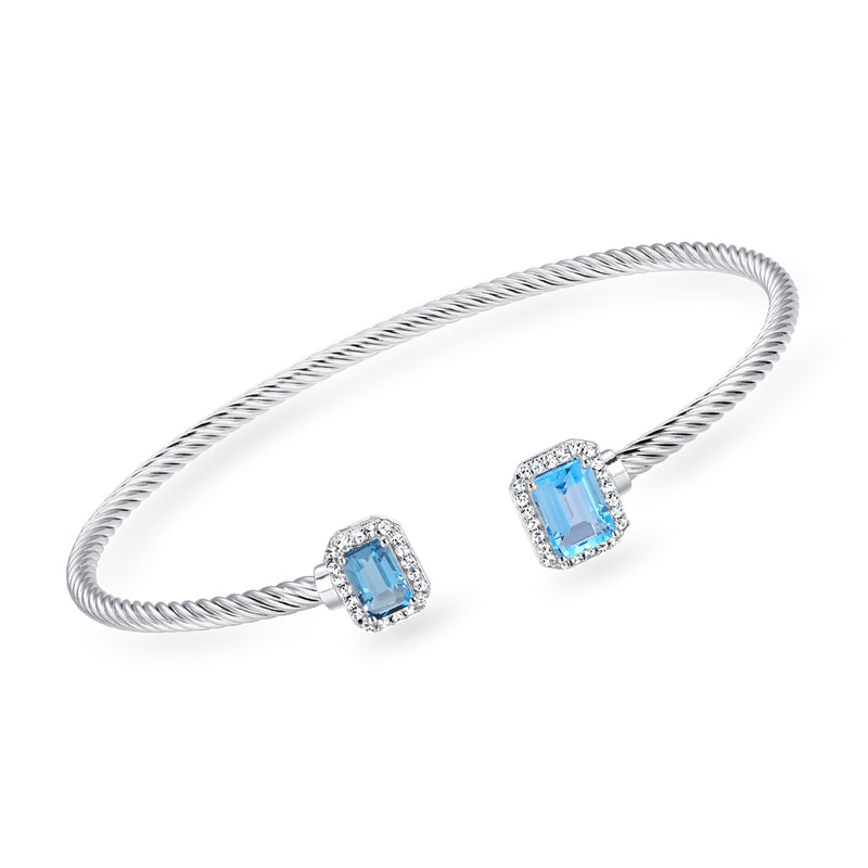 Sterling silver cuff bracelet with two square London blue topaz stones and halo detail