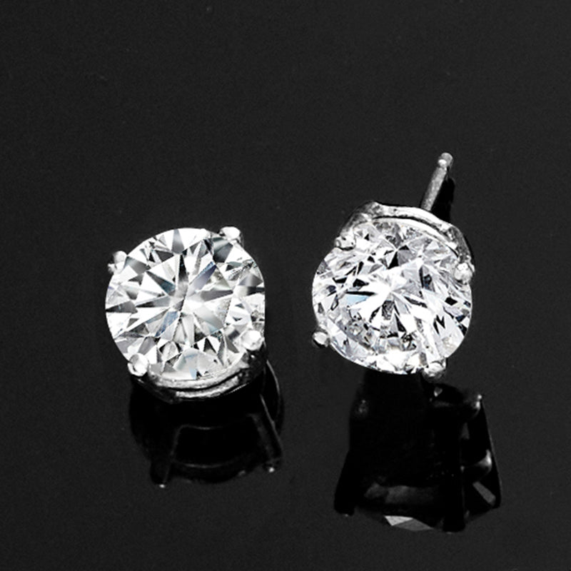 Round lab-grown diamond stud earrings, platinum prong-set, visible posts