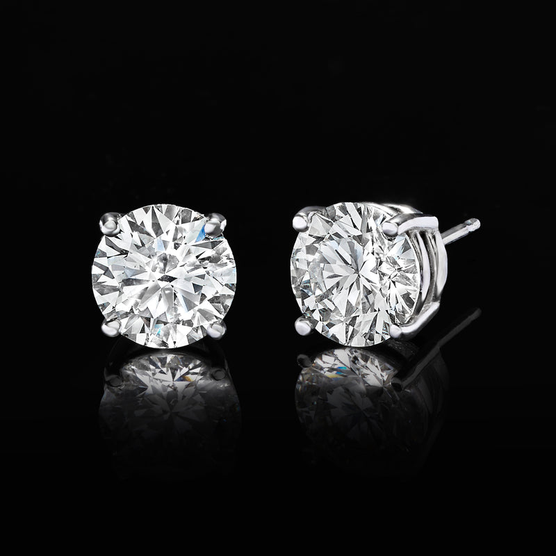 Platinum lab-grown diamond stud earrings, round stones in four-prong settings