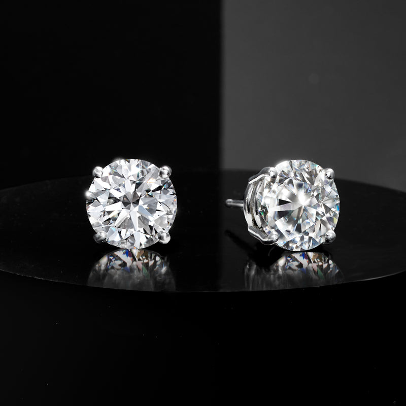 Platinum lab-grown diamond stud earrings, round stones with four prongs