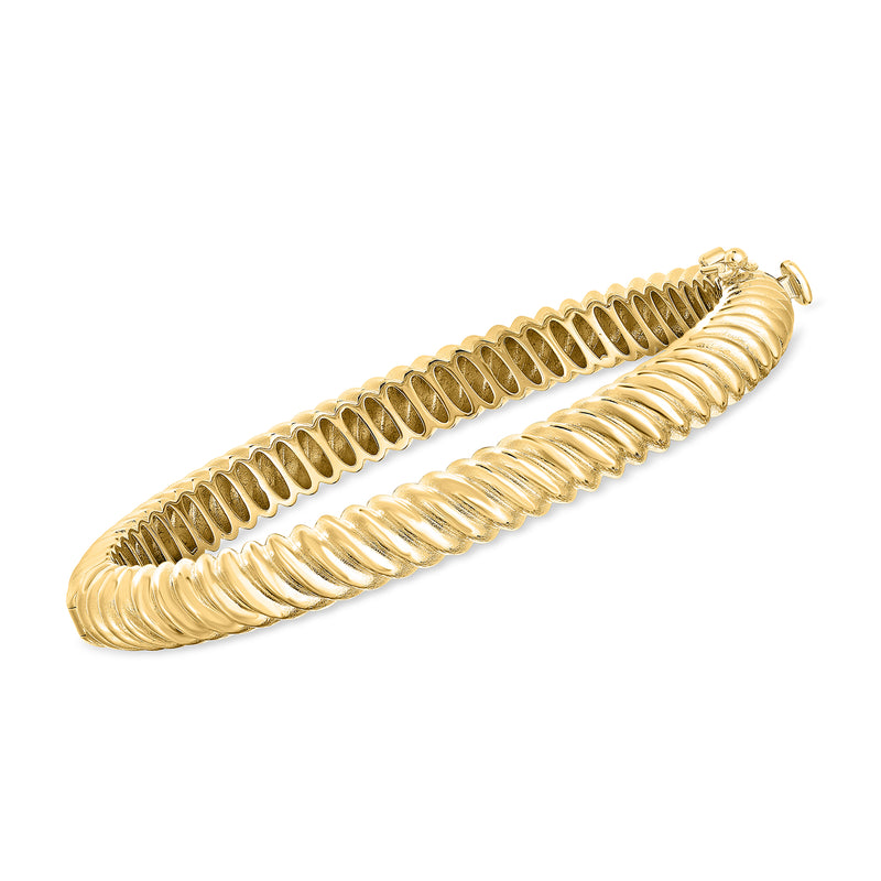 Twisted 14kt yellow gold bangle bracelet with ribbed coil texture