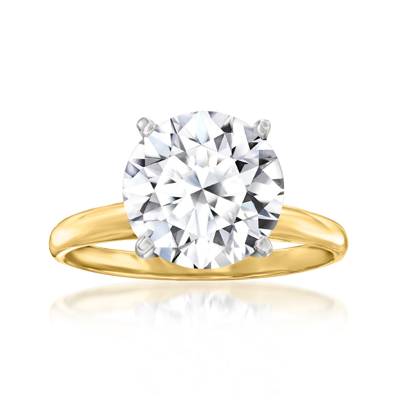 14kt yellow gold solitaire diamond ring with round center stone and four prongs