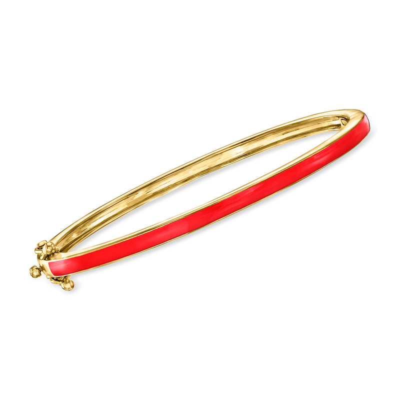 Gold bangle bracelet with red enamel inlay and clasp ends, hinged open design.