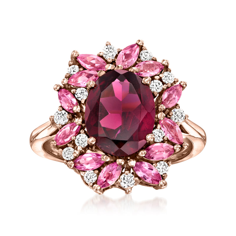 14kt rose gold cluster ring with faceted dark pink gemstone, pink stones and diamonds