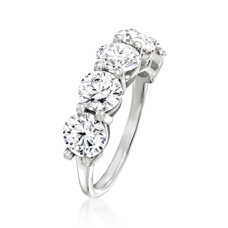 Five-stone round diamond ring, side view with five clear stones in prong setting