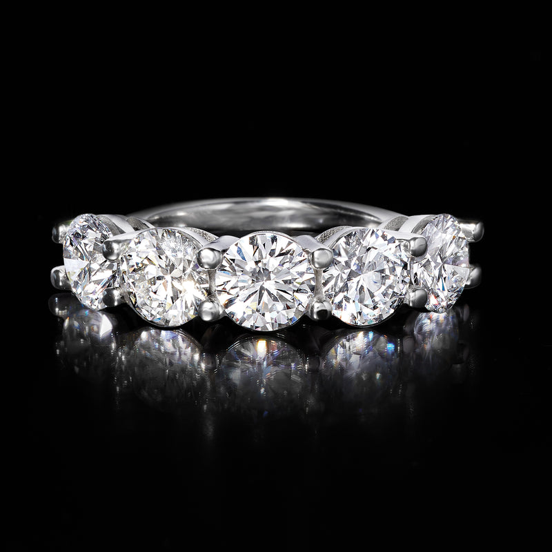 Five-stone round diamond ring in white gold, reflective view showing five prong-set stones