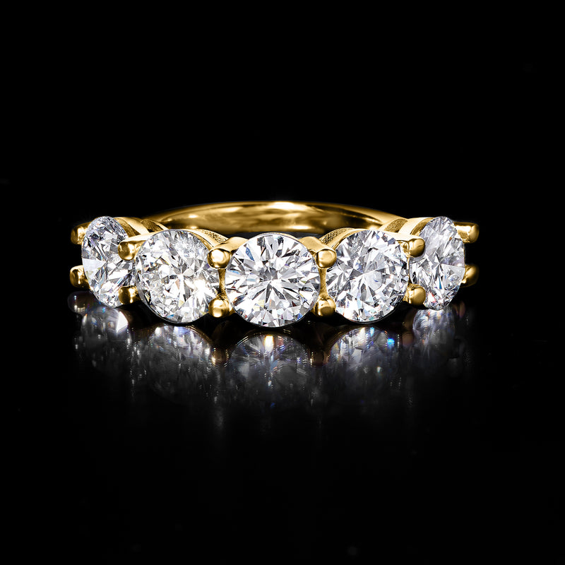 14kt yellow gold five-stone diamond ring with five round stones, angled view