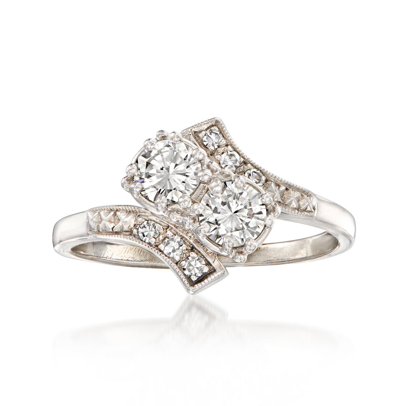 Vintage Jabel platinum bypass ring with round and marquise diamonds
