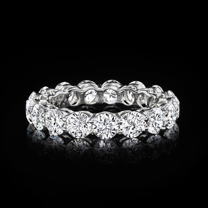 14kt white gold eternity band with bright round diamonds, snug shared-prong design