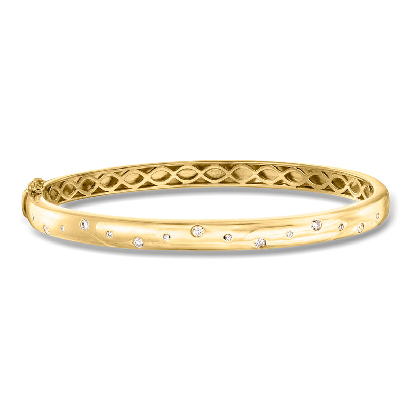 Gold over sterling bangle with dotted zigzag lattice and small round diamonds