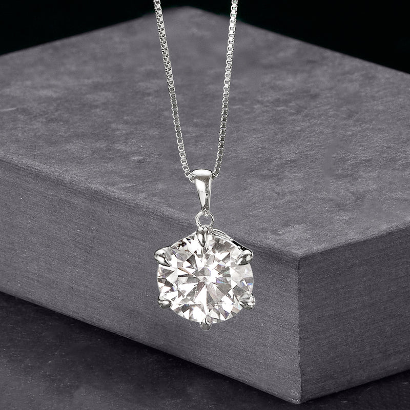 Sterling silver round solitaire pendant on chain with large clear-cut gemstone
