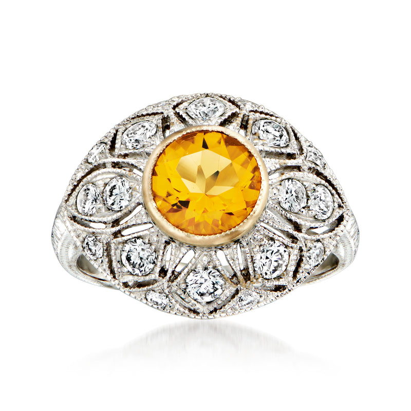 Vintage 18k white gold ring with round yellow citrine center and diamond halo accents