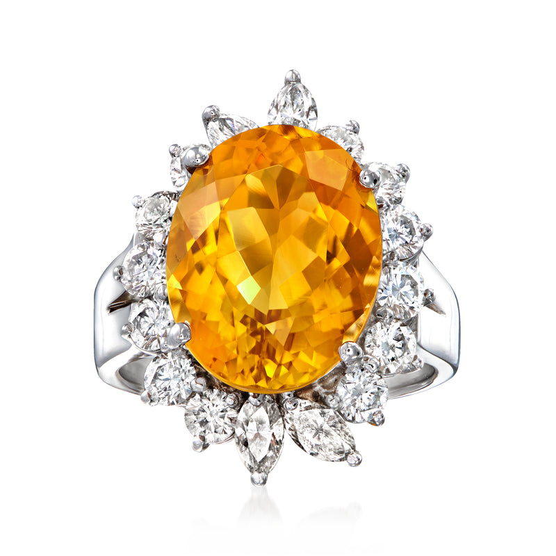 18kt white gold ring with oval citrine center and diamond halo, marquise accents