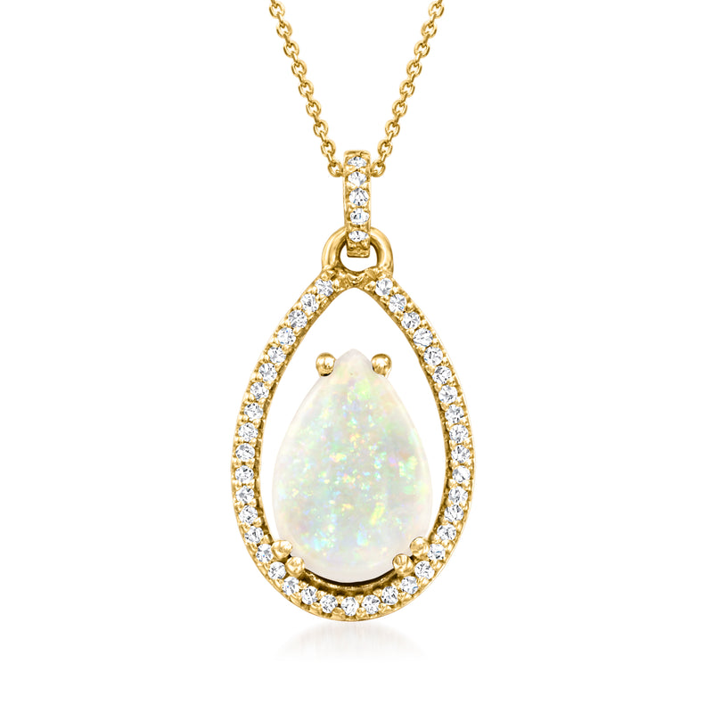 14kt yellow gold teardrop opal pendant with diamond halo and bezel on chain