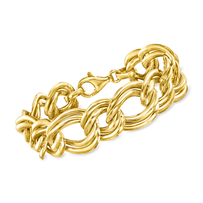 Gold over sterling multi-link bracelet with interlocking oval and twisted chain links