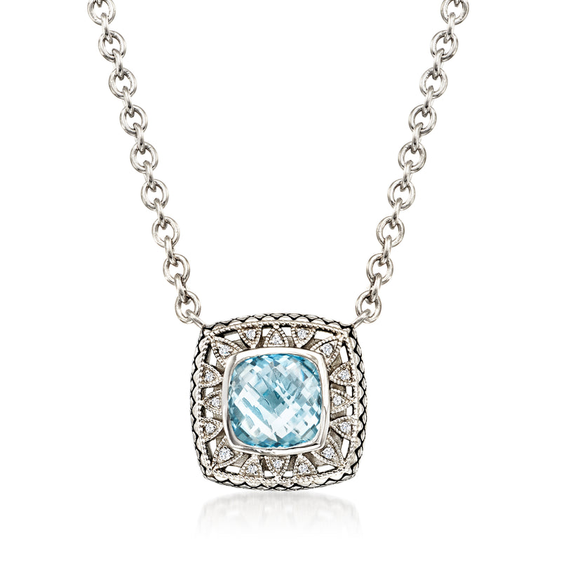 Sterling silver necklace with cushion-cut sky blue topaz and diamond halo pendant