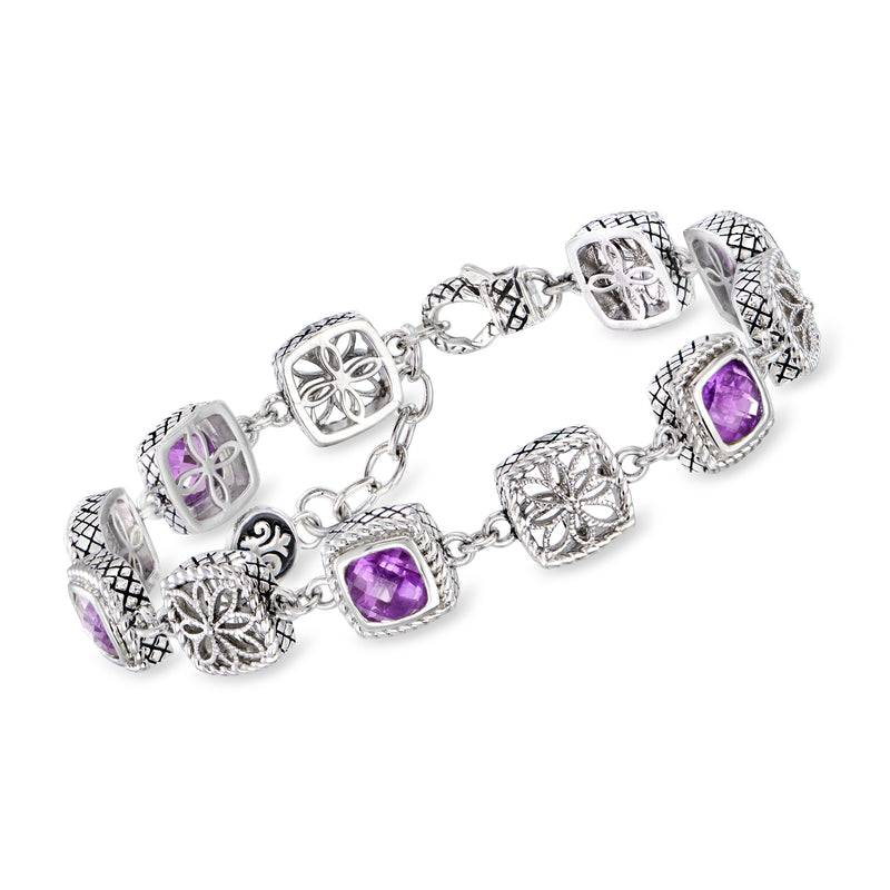 Sterling silver amethyst charm bracelet with purple square stones and patterned links