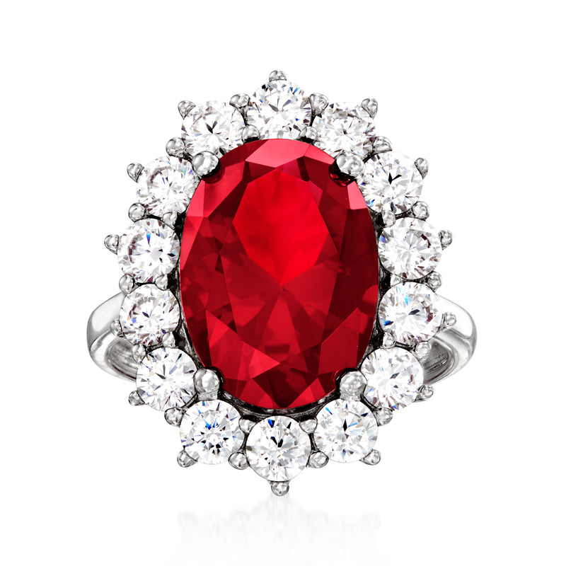 Oval red simulated ruby-look center CZ halo ring in sterling silver with round stones
