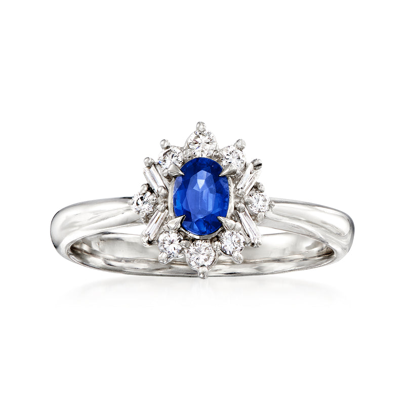 Vintage platinum sapphire and diamond ring with oval blue center stone