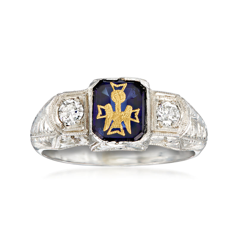Vintage men's insignia ring with dark blue sapphire, gold emblem, and small diamond accents