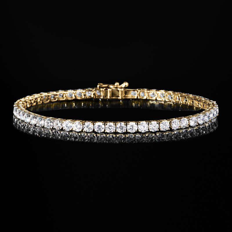 Yellow gold tennis bracelet with round diamond row and box clasp