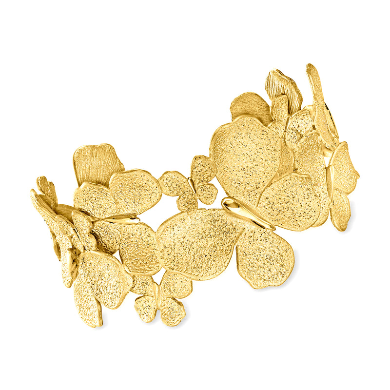 Gold-tone butterfly cuff bracelet with textured wing motifs and open bangle design