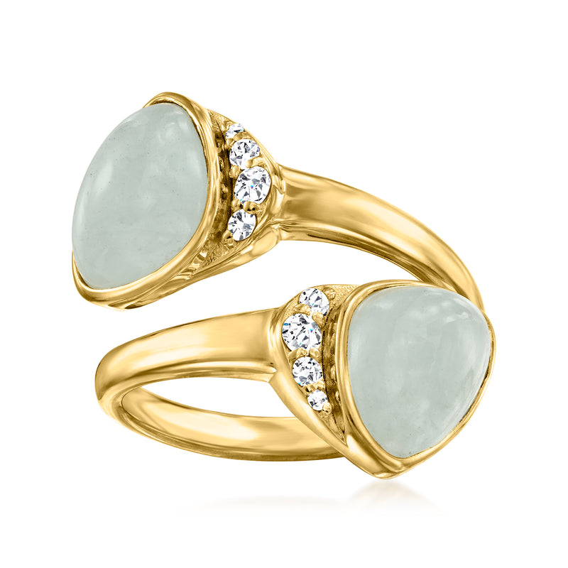 Gold over sterling bypass ring with pale aquamarine oval stones and white topaz accents