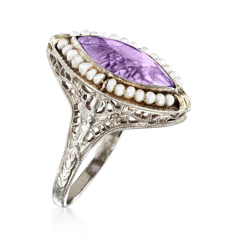 Amethyst and seed pearl navette ring with oval purple center stone in ornate white gold