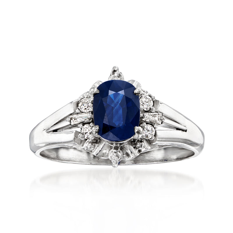 Vintage platinum sapphire and diamond ring, oval blue center stone with side diamonds