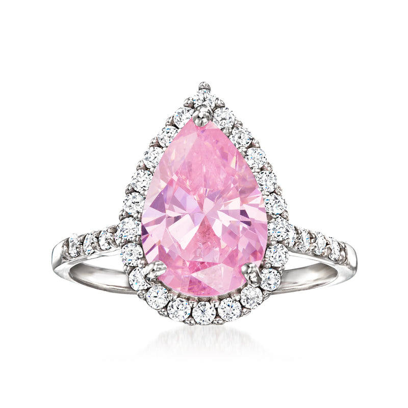 Sterling silver ring with oval pink simulated gemstone and round CZ halo