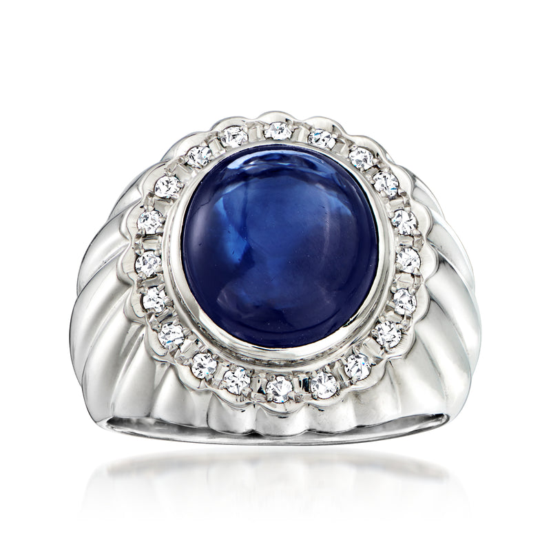 Platinum oval sapphire ring with diamond halo and scalloped band, vintage style