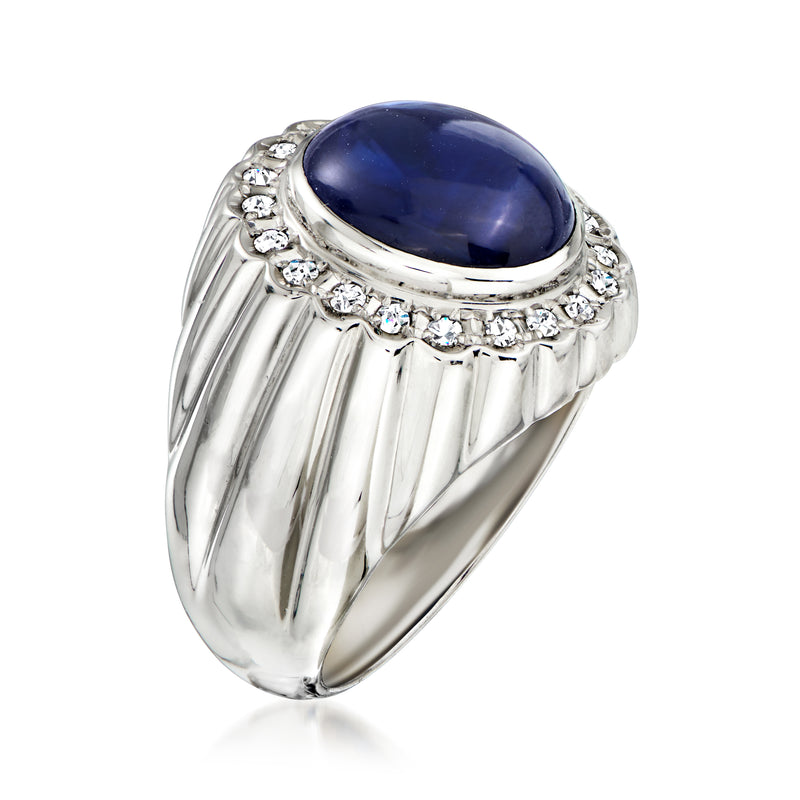 Platinum sapphire ring with diamond halo and ridged shoulders, side view