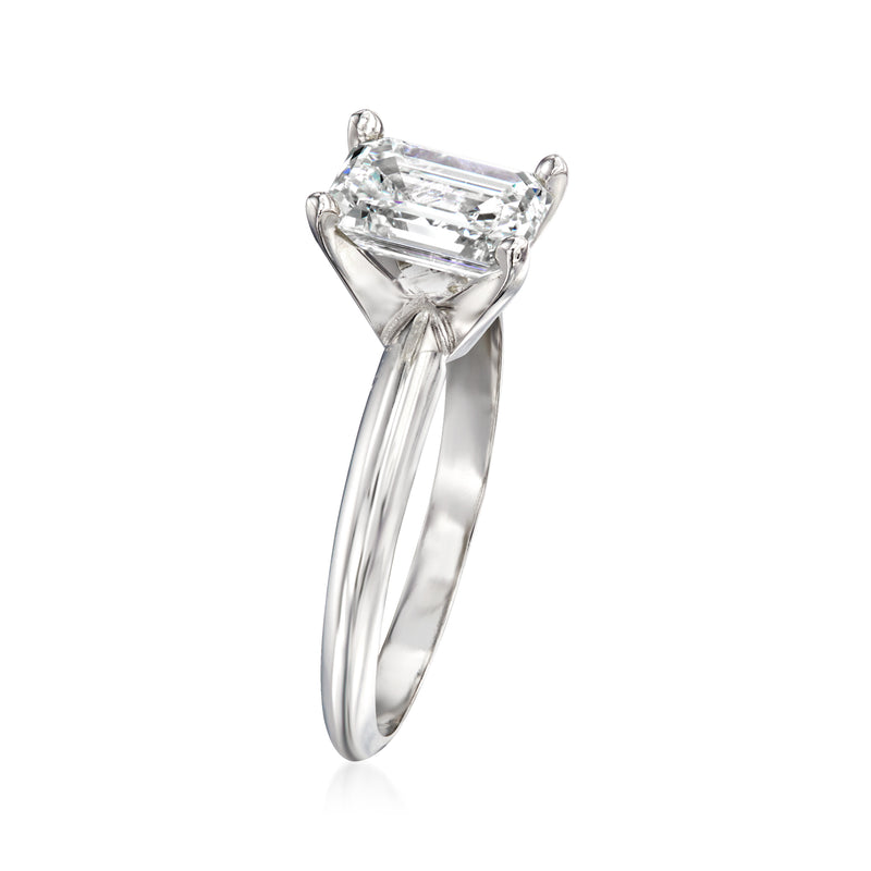 14kt white gold diamond solitaire ring with angled emerald-cut center stone