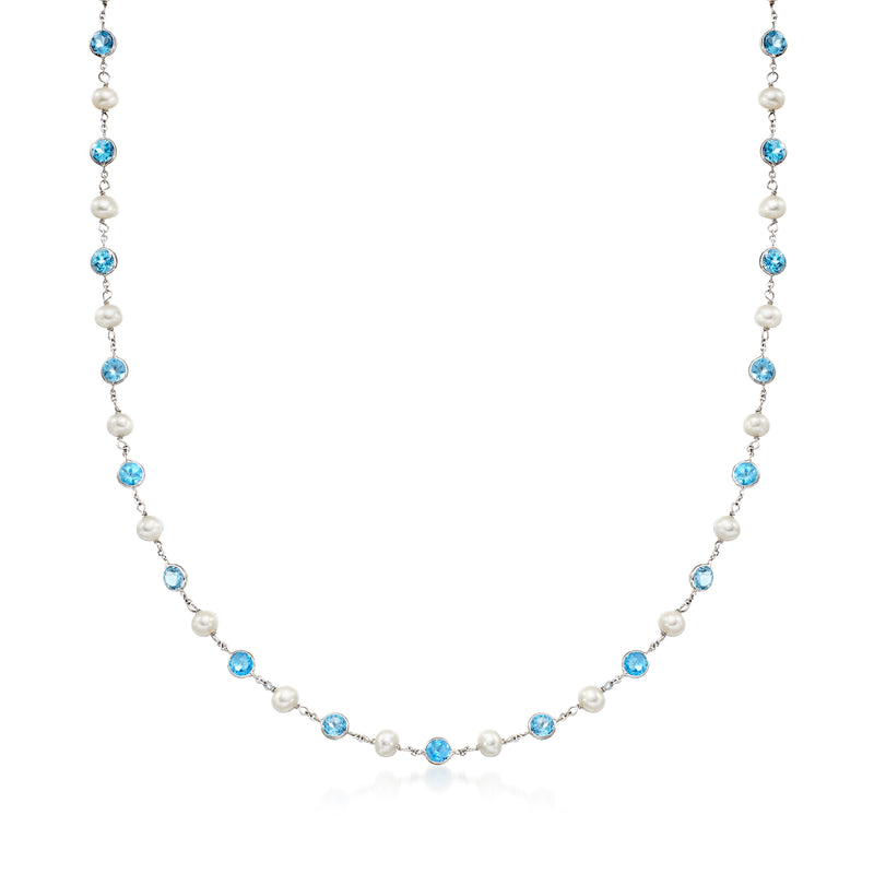 14kt white gold station necklace with cultured pearls and round blue topaz stations