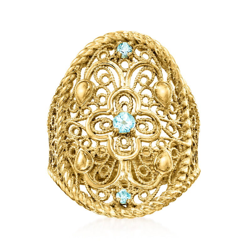 18kt gold over sterling scrollwork ring with light blue topaz-style gemstone