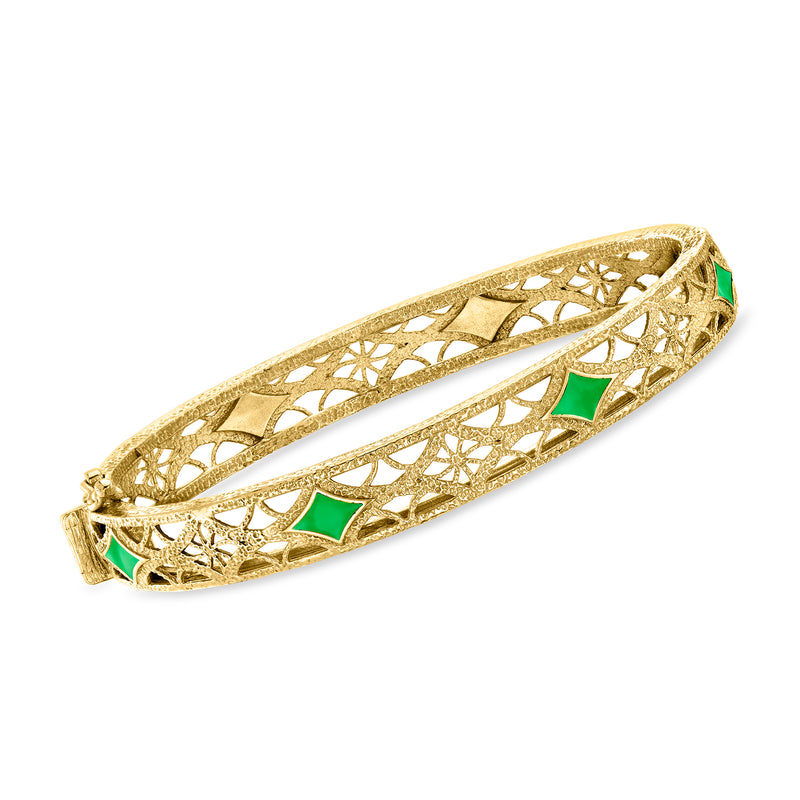 Gold filigree bangle bracelet with green enamel inlays