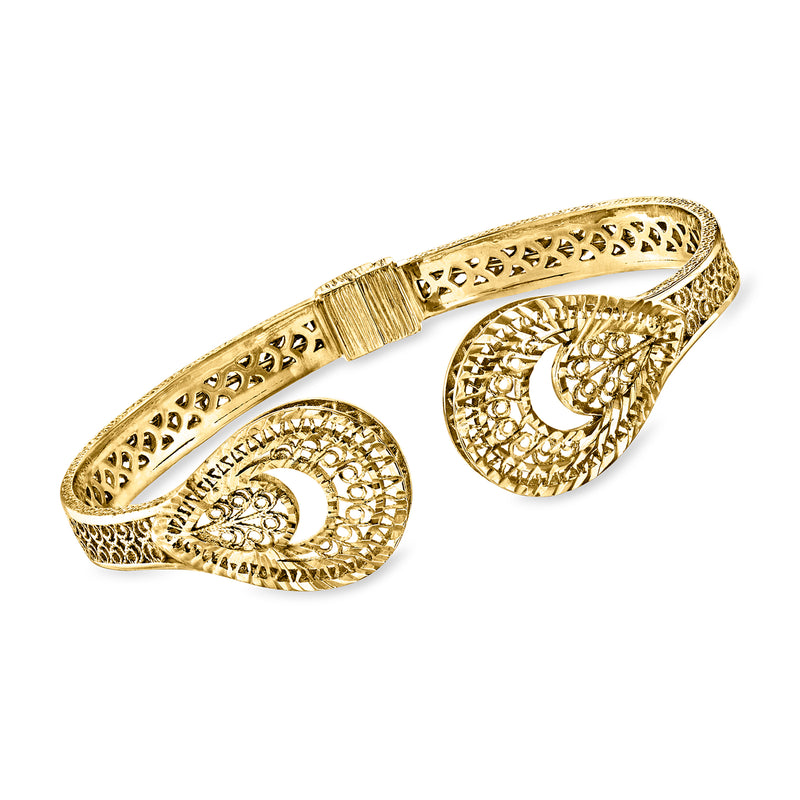 Gold-tone filigree cuff bracelet with ornate crescent cutout detailing