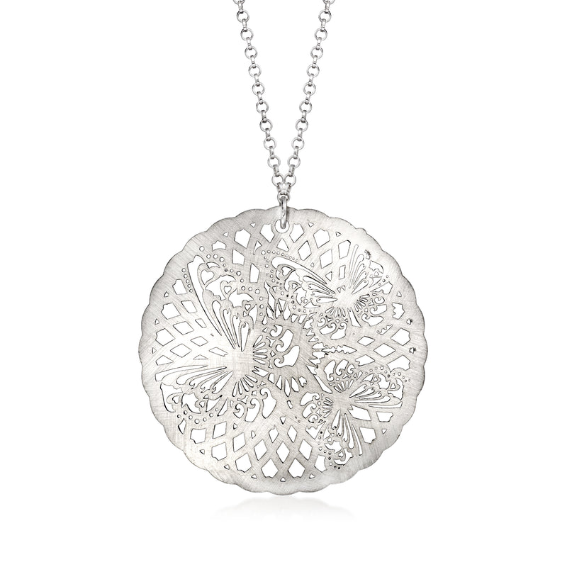 Sterling silver filigree butterfly pendant on a round coin-style necklace medallion