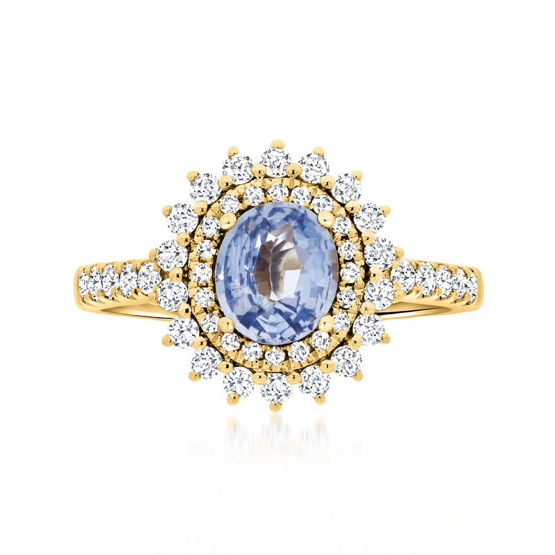 14kt yellow gold oval sapphire halo ring with white diamond clusters
