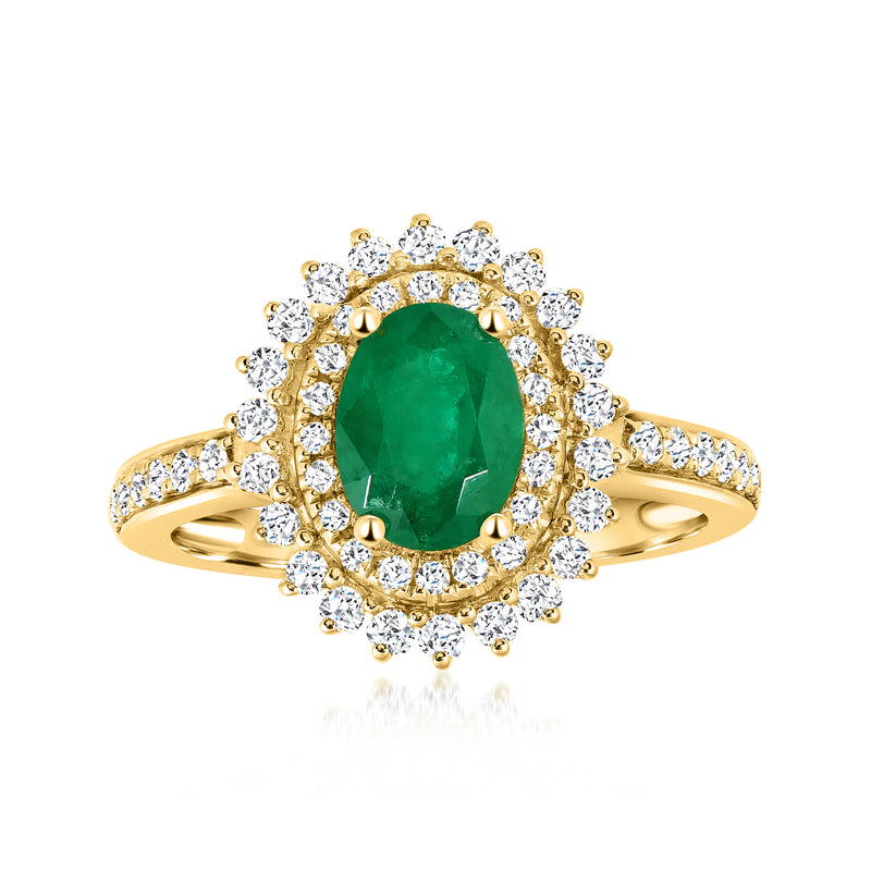 Oval emerald gemstone ring in 14k yellow gold with diamond halo and side accents