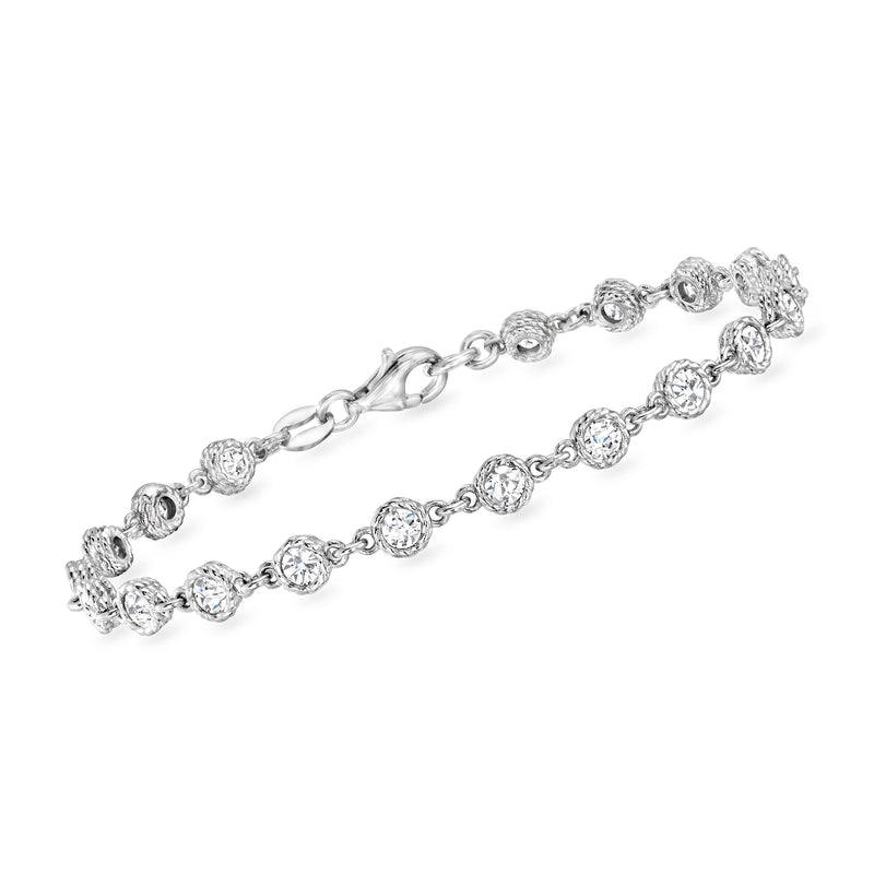 Sterling silver station bracelet with round CZ bezel-set clusters and link chain